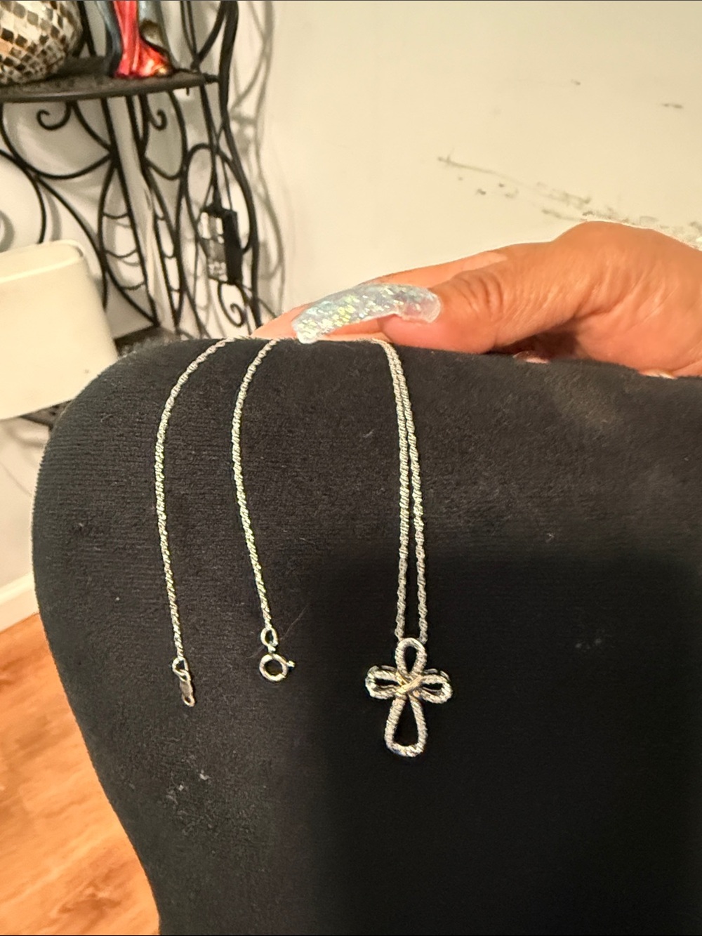 Sterling silver infinity cross with diamond chips and 10k
